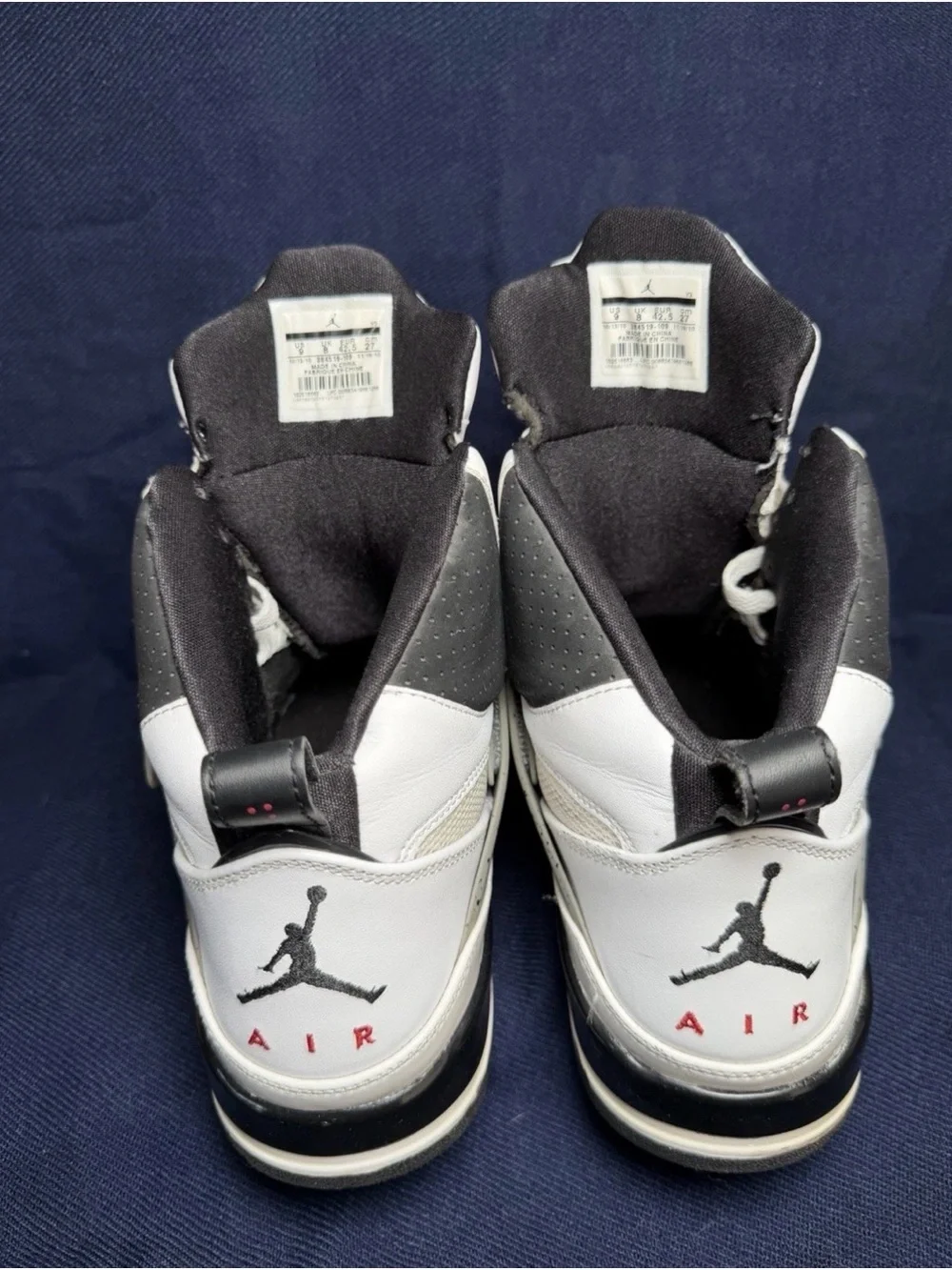 Jordan White and Black High-Top Basketball Sneakers with Gray Accents